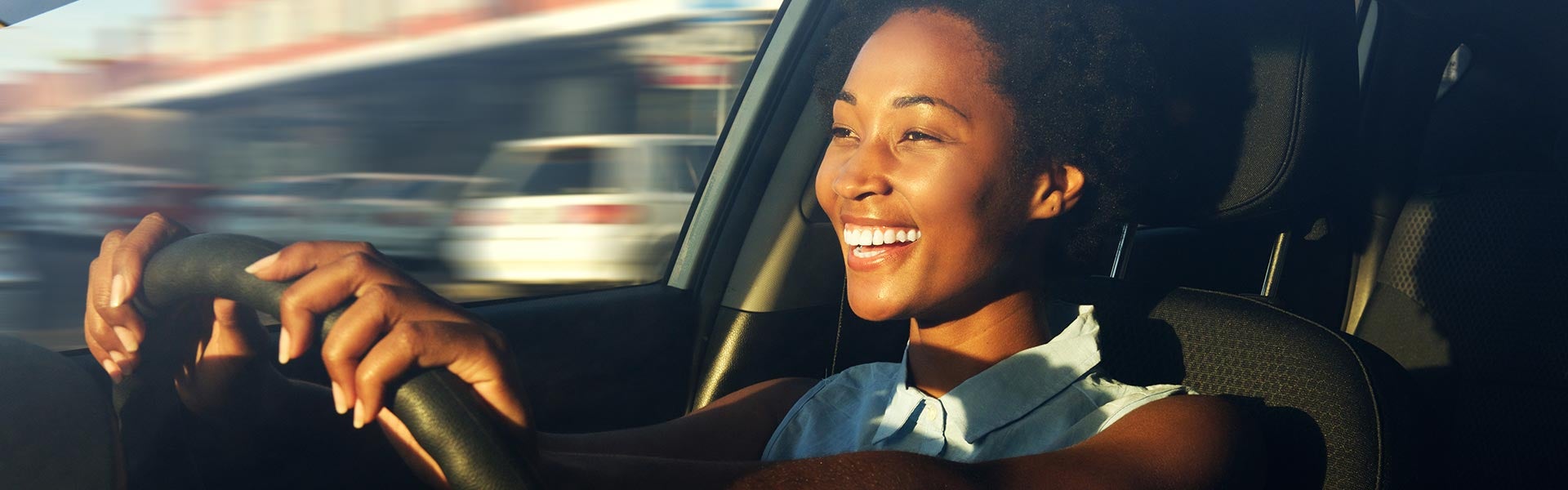 woman driving car Miller Auto Body Shop in St. Cloud MN